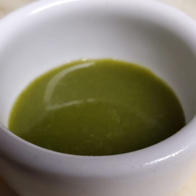 Side of cilantro chutney.